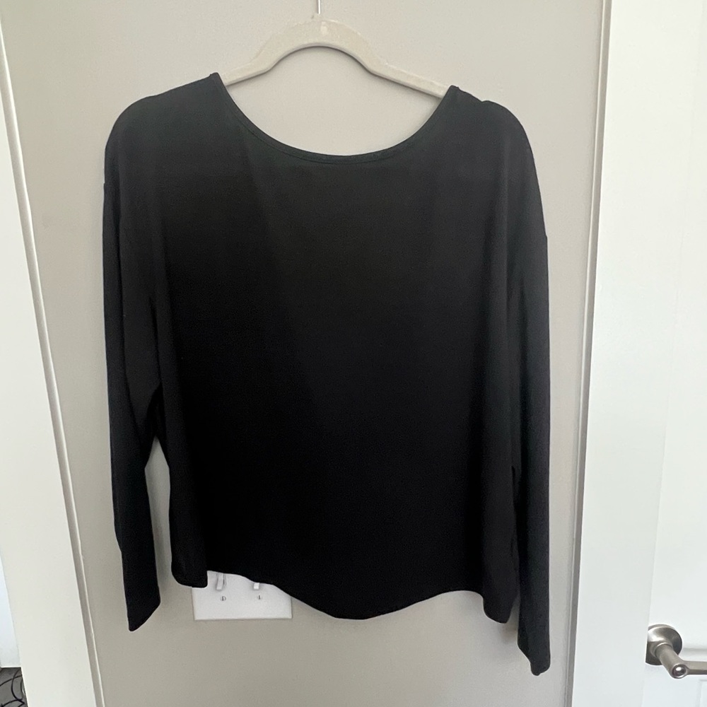 Twist back long sleeve blouse